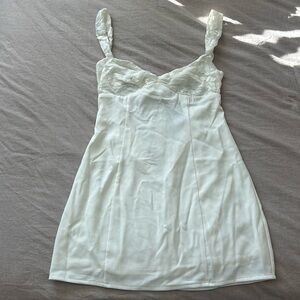 White fox “no you hang up” mini dress in cream.